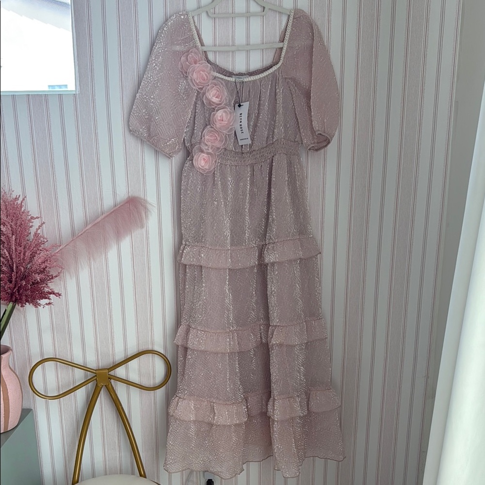 Elegant Pink Ruffled Dress with Floral Accents